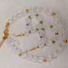 Elegant Clear Crystal and Gold-Tone Beaded Necklace with Matching Earrings